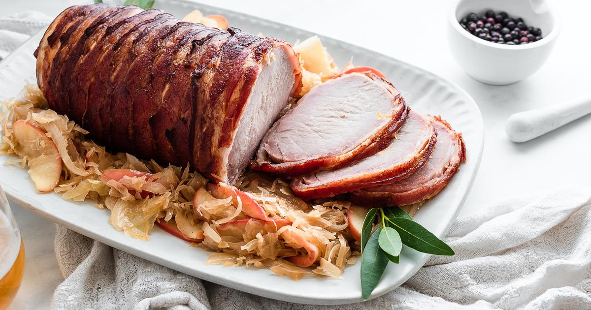 A New Year’s Roast for Riches: Bacon-Wrapped Pork Loin With Cider-Braised Sauerkraut