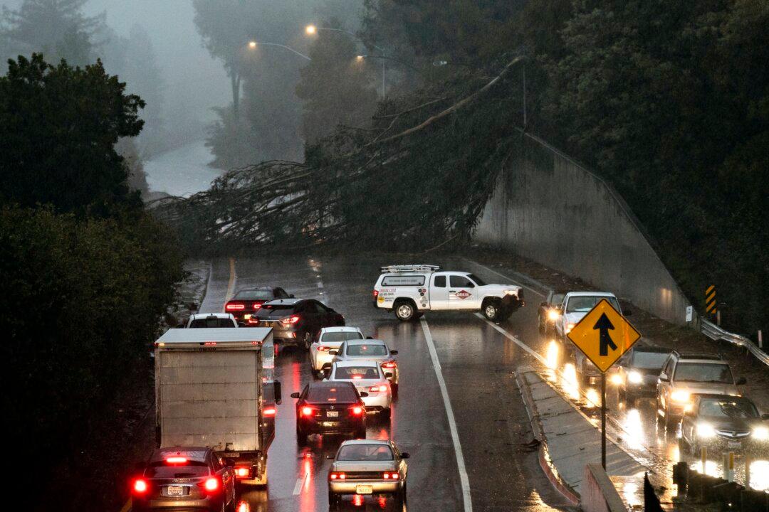 2 Dead in Submerged Car as California Storm Worries Spread
