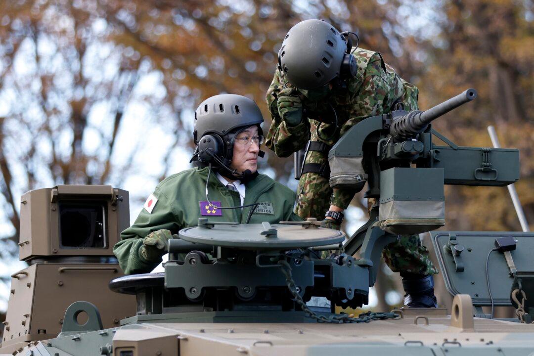 Japan Cabinet OKs Record Defense Budget Amid Taiwan Concerns