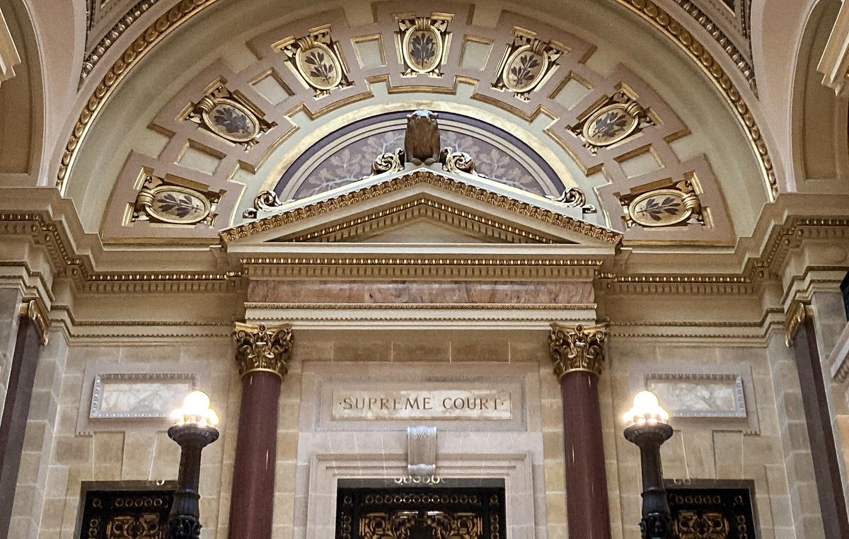 Wisconsin Supreme Court Takes Up Challenge to COVID-19 Mask Orders