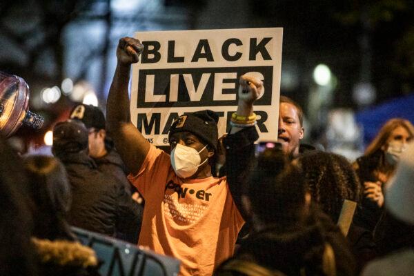Black Lives Matter activists in Los Angeles on Dec. 30, 2020. (John Fredricks/The Epoch Times)