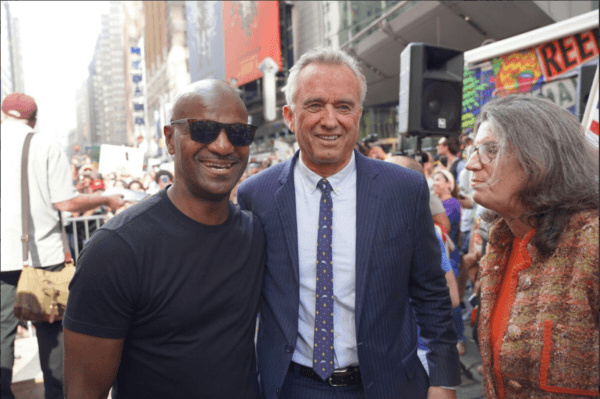 Kevin Jenkins (L), Robert F. Kennedy Jr. (C), and Mary Holland (R) speak at Broadway Rally for Freedom in New York on Oct. 16, 2021. (Enrico Trigoso/The Epoch Times)