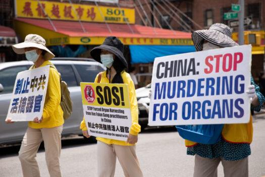 Falun Gong practitioners take part in a parade marking the 22nd year of the persecution campaign against Falun Gong in China, in Brooklyn, N.Y., on July 18, 2021. (Chung I Ho/The Epoch Times)