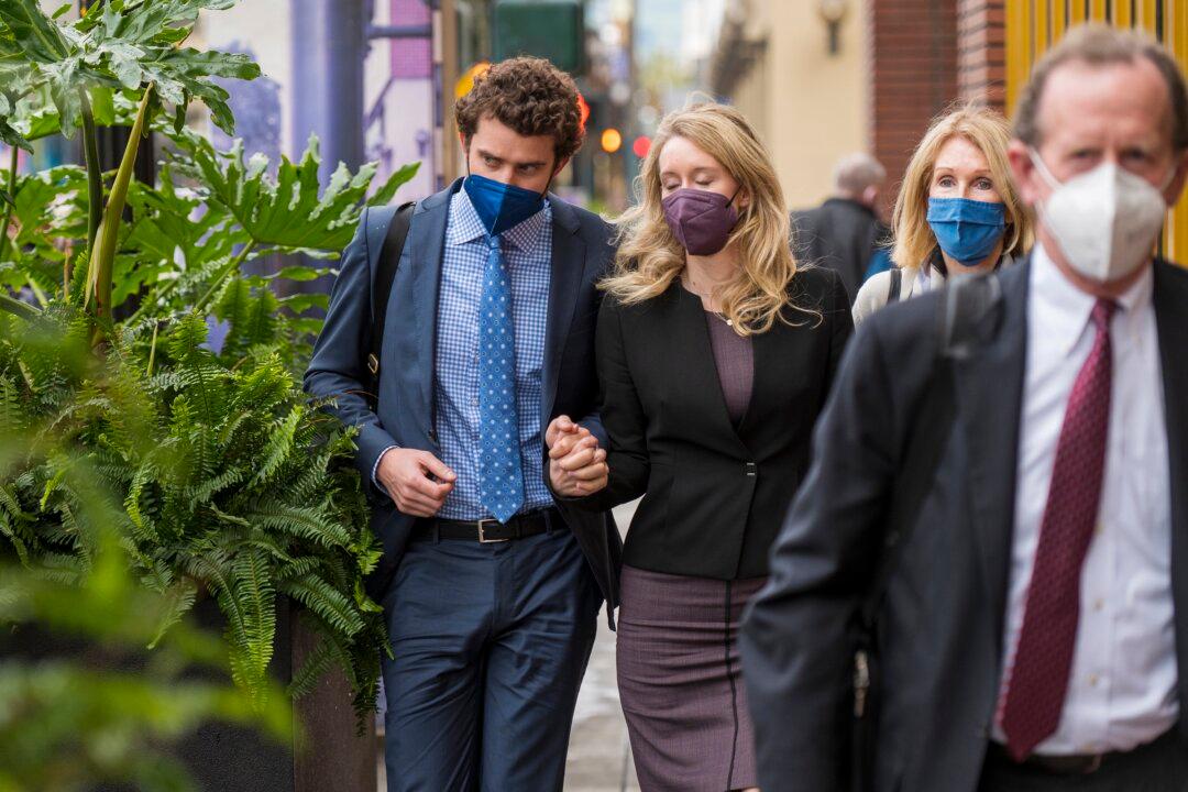 Holmes Jury to Take Break After 6 Days of Deliberation