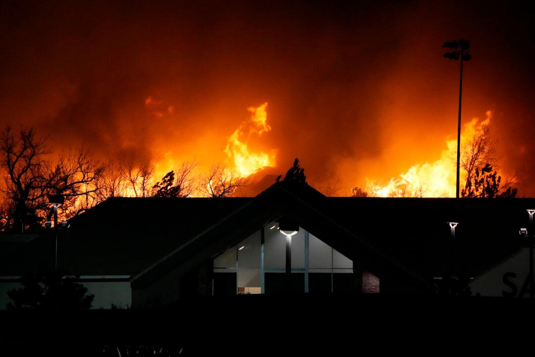 30,000 Evacuated, Hundreds of Homes Burned in Fast-Moving Colorado Wildfires