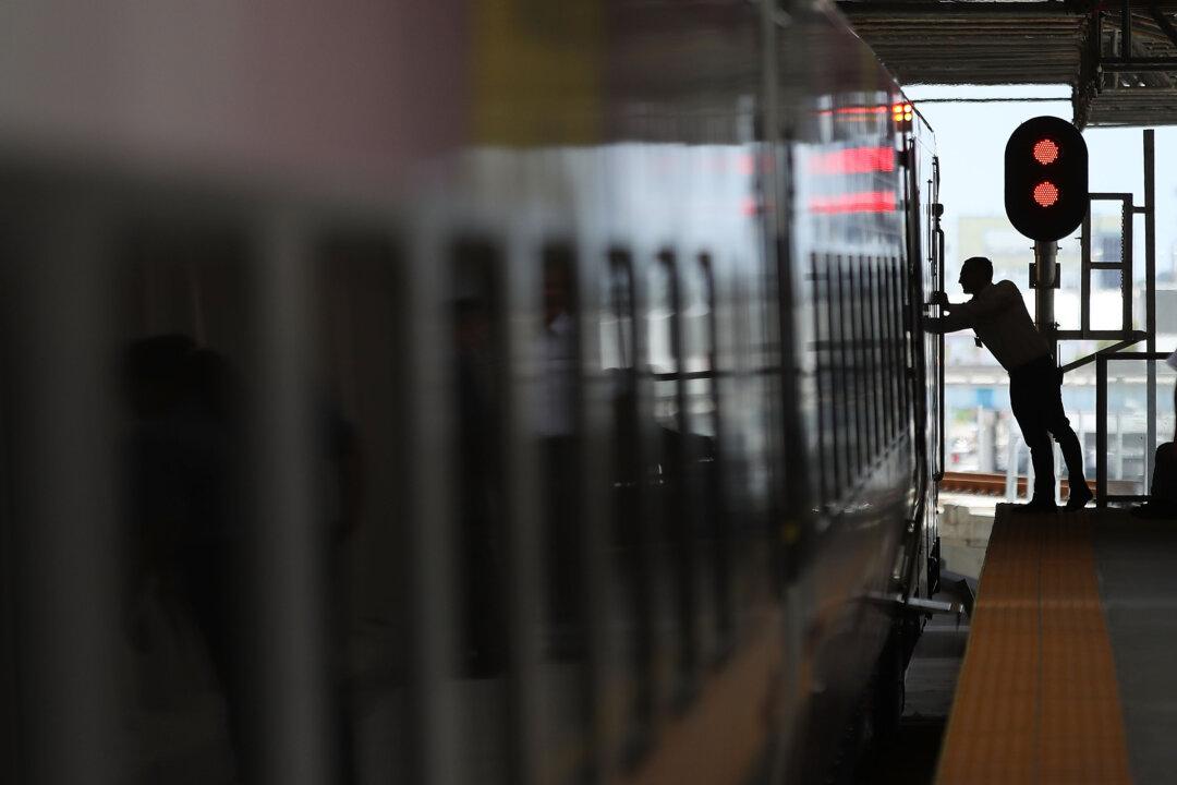 2 Killed When Train Hits Car Going Around Crossing Gate