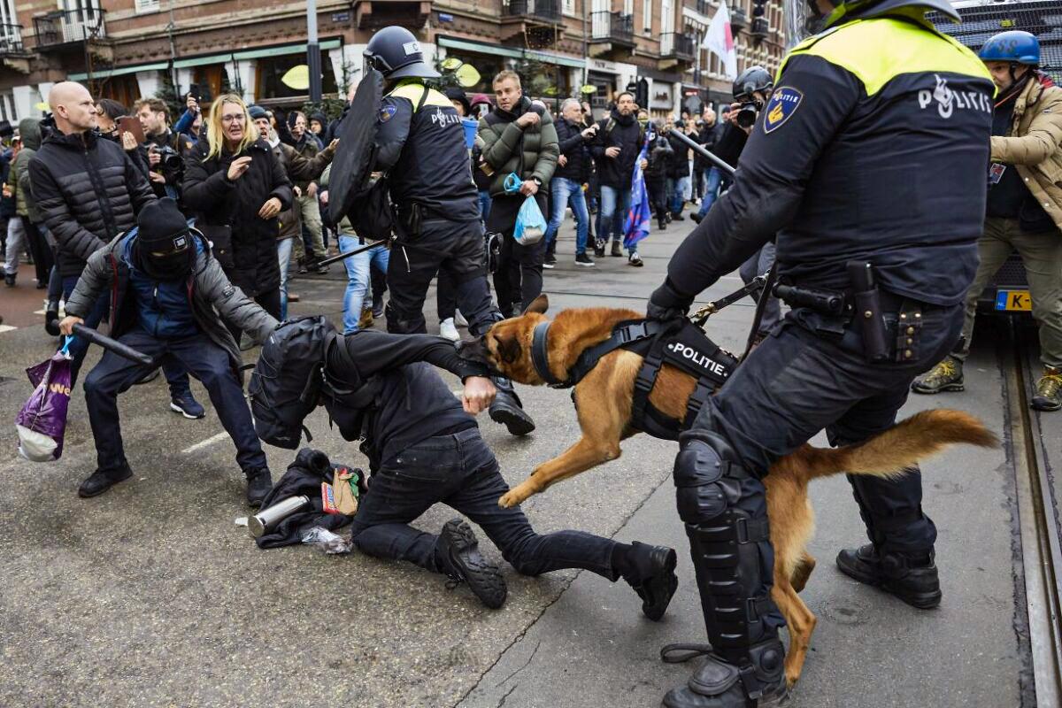Police Use Dogs as Thousands Protest Against Dutch COVID-19 Lockdowns