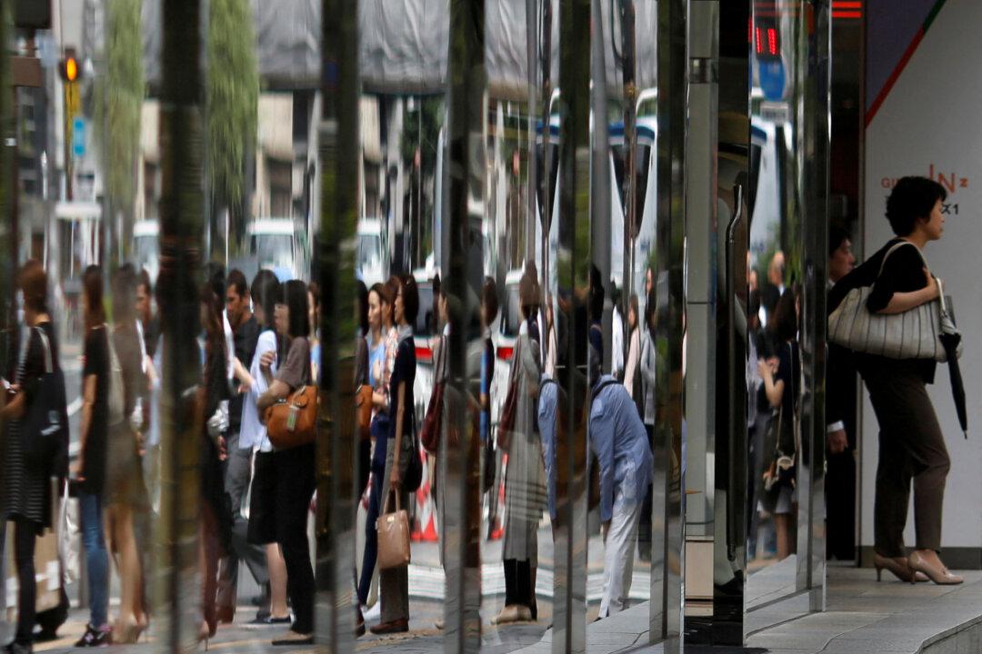 Japan Downgrades Fourth Quarter GDP on Service Sector Weakness