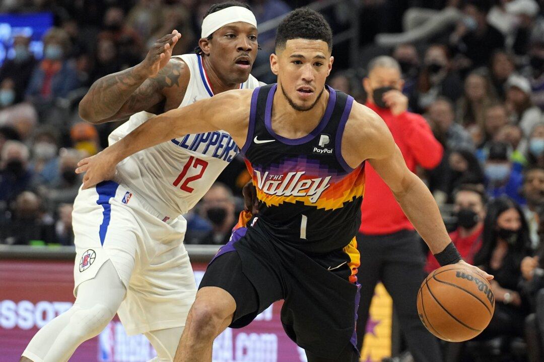 Paul Has Triple-Double, NBA-Leading Suns Top Clippers 106–89