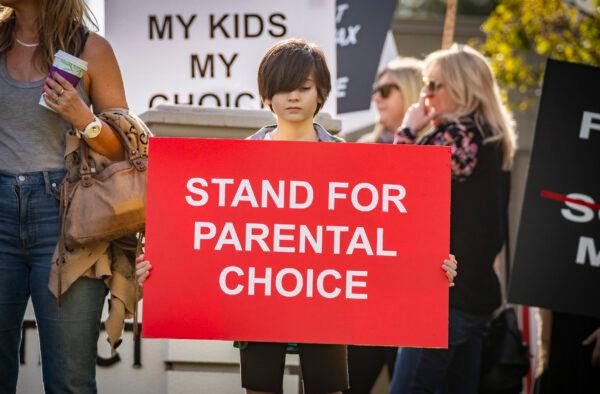 Parents and students gather in protest of school district policies at the Placentia Yorba Linda Unified School District offices in Placentia, Calif., on Jan. 18. (John Fredricks/The Epoch Times)