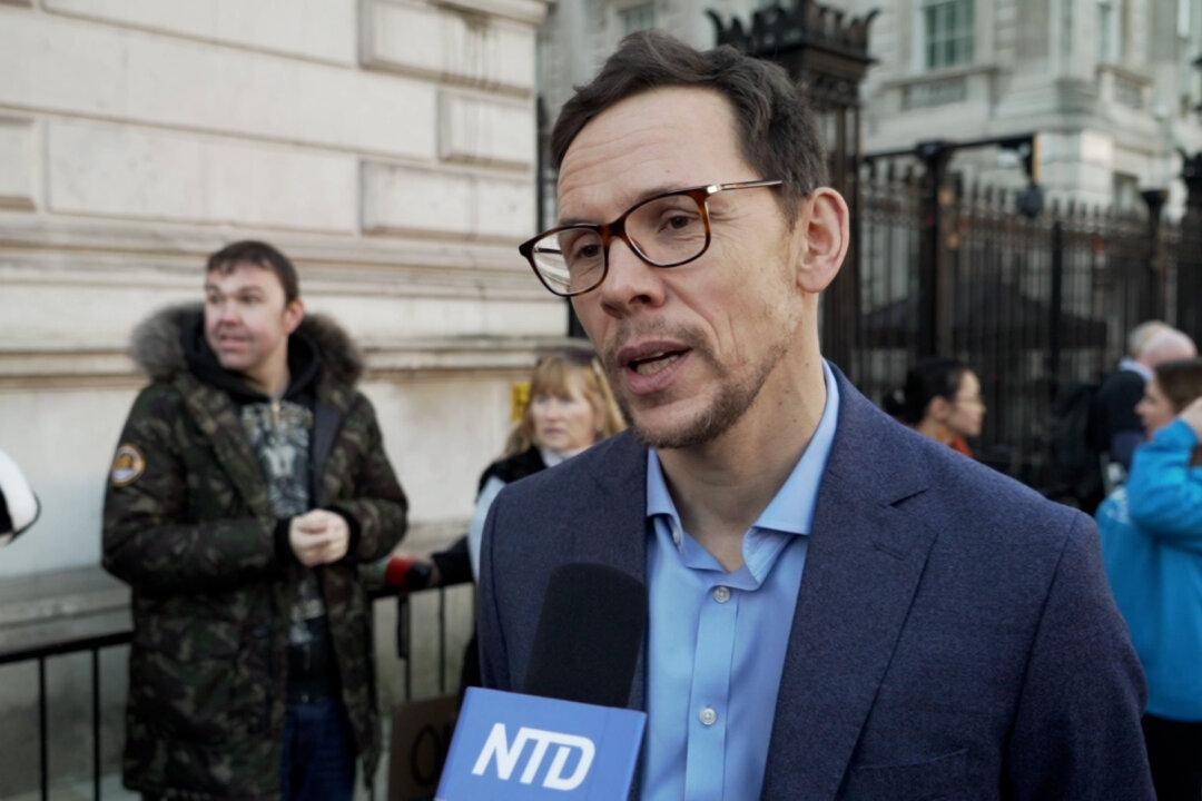 UK Government Faces Legal Challenge Over Vaccine Mandate for Health Care Workers