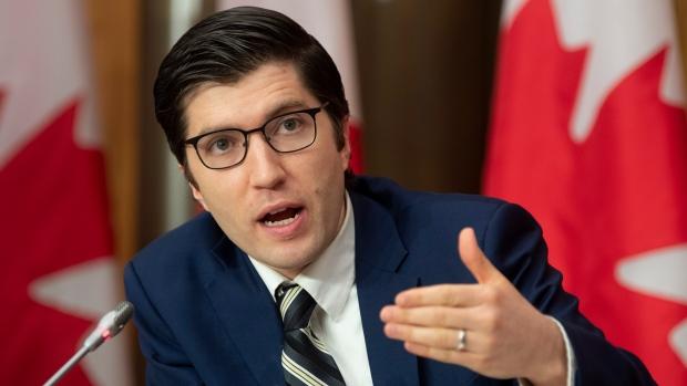 Conservative MP Garnett Genuis responds to a question during a news conference in Ottawa on Nov. 26, 2020. (The Canadian Press/Adrian Wyld)