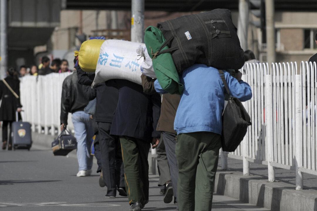 Beijing Migrant Worker’s Search for Son Sparks Outrage, Sympathy