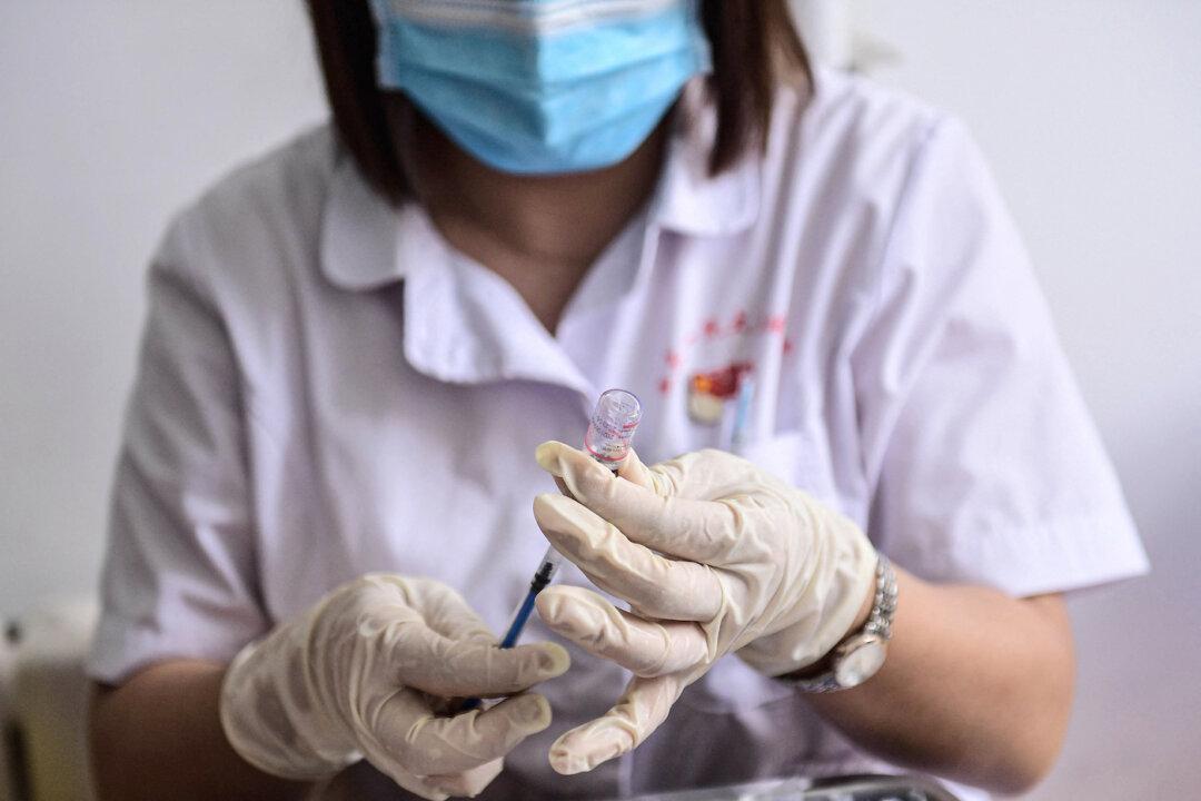 Victims of Chinese COVID Vaccine Injuries Demand Fair Investigation, Compensation