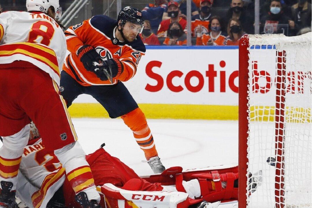 NHL Roundup: Oilers Turn Back Flames, End Skid at 7 Games