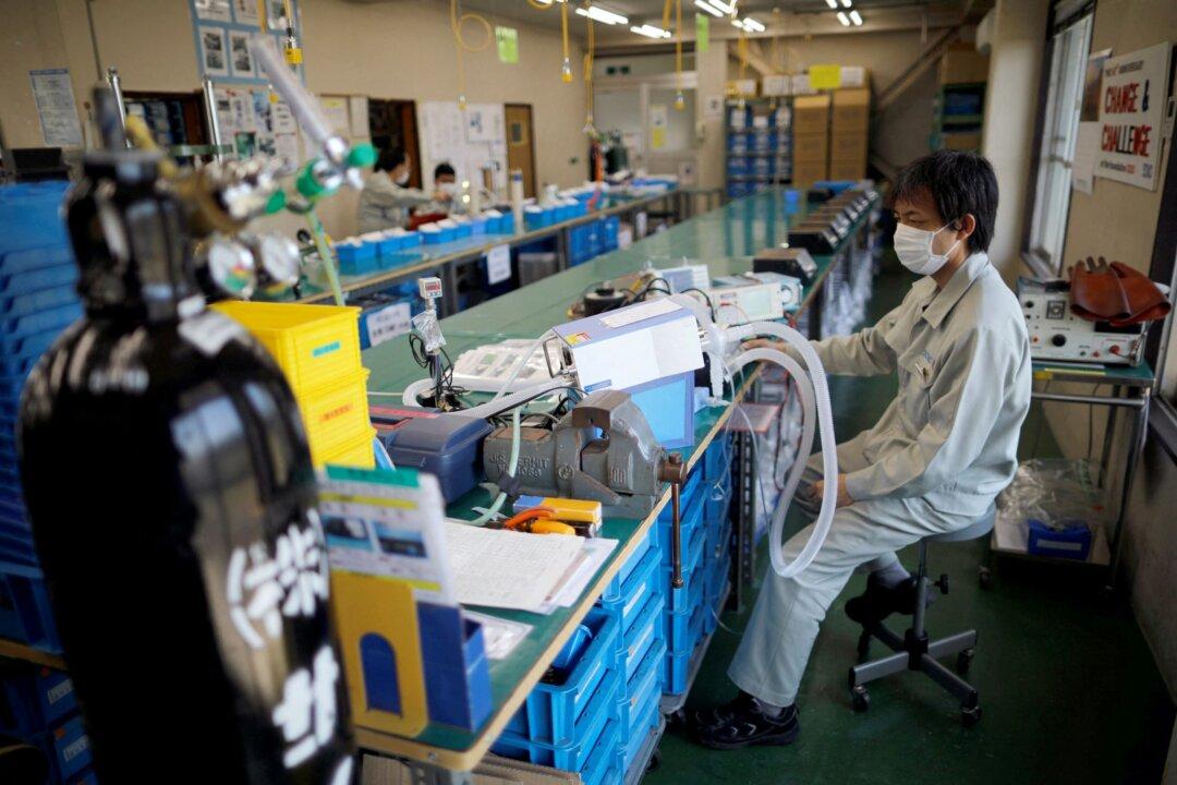 Japan January Factory Growth Hits Four-Year High, but Services Contract-Flash PMI
