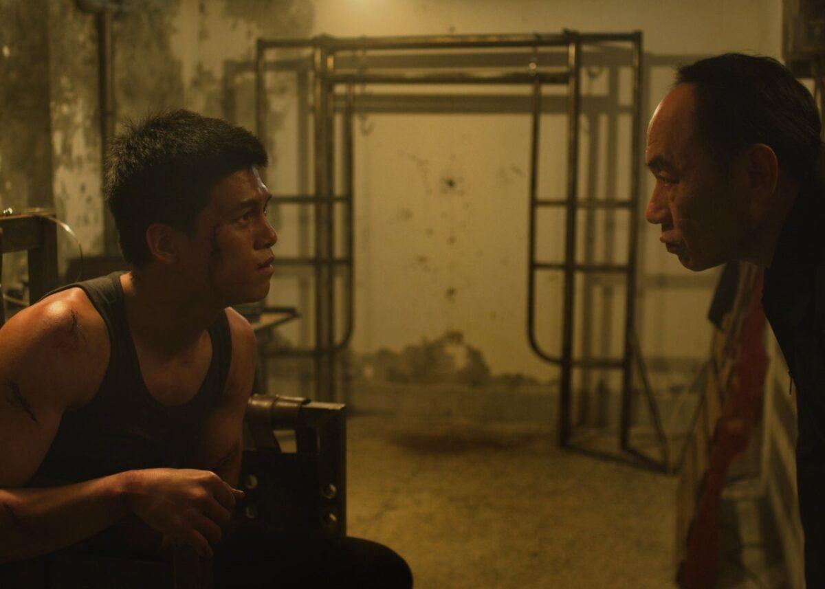 Wang (Ting Wu) in a prison cell after being tortured for practicing Falun Gong. (Courtesy of Flying Cloud Productions)