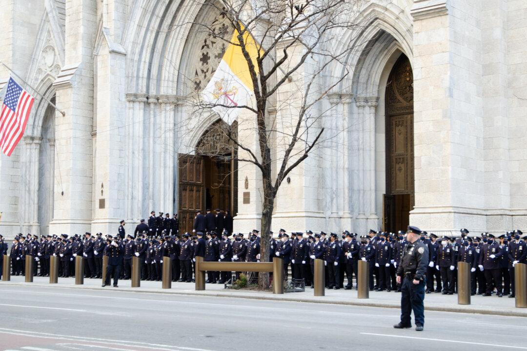 Hundreds of Police Turn Out to Wake of First of Two Slain NYPD Officers