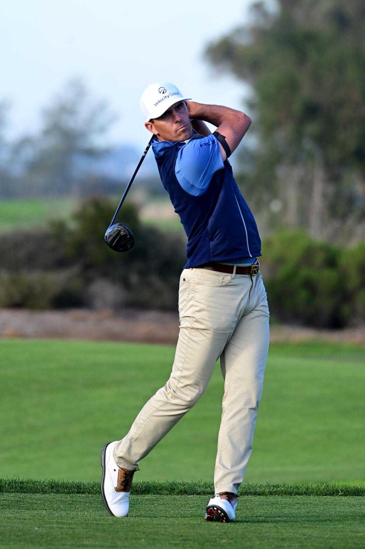 Billy Horschel hits his tee shot on the 18th hole during the first round of The Farmers Insurance Open on the North Course at Torrey Pines Golf Course, in La Jolla, California, on January 26, 2022. (Donald Miralle/Getty Images)