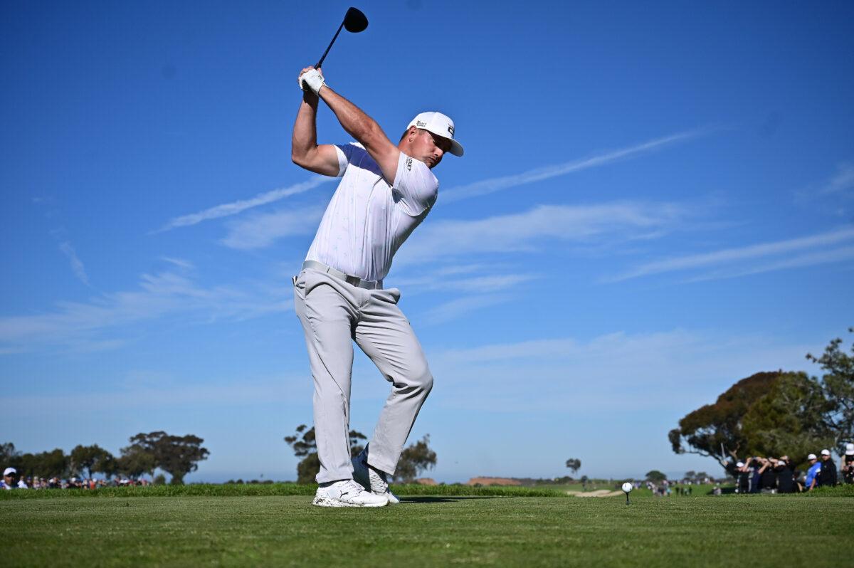 Bryson DeChambeau hits his tee shot on the 13th hole during the first round of The Farmers Insurance Open on the North Course at Torrey Pines Golf Course, on January 26, 2022. (Donald Miralle/Getty Images)