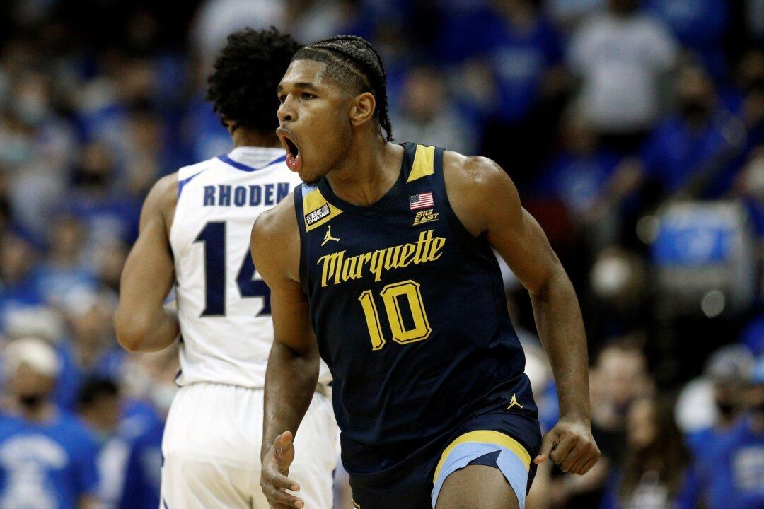 Freshman Lewis Scores 33, No. 22 Marquette Beats Seton Hall