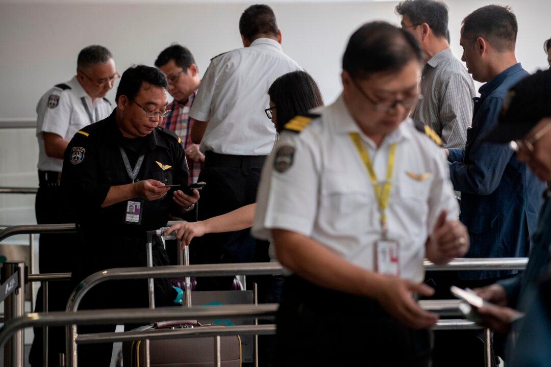 Prevalence of Fake ID Cards For Senior Chinese Communist Officials