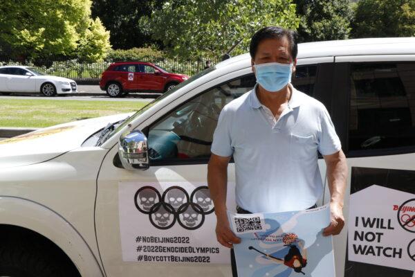 Frank Jie Ruan, editor of the Tiananmen Times, standing in front of a car in Melbourne, Victoria on Feb. 4, 2022 (The Epoch Times)