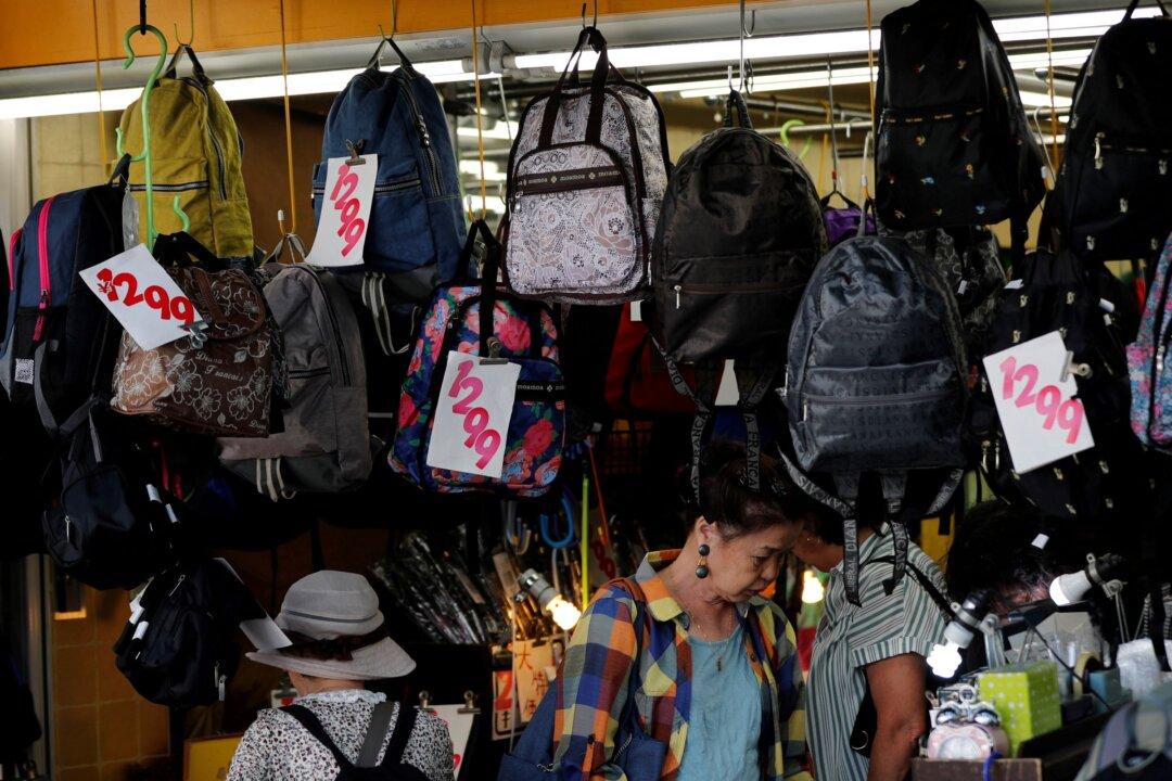 Japan Has No Plans to Review Sales Tax Rates, Finance Minister Says