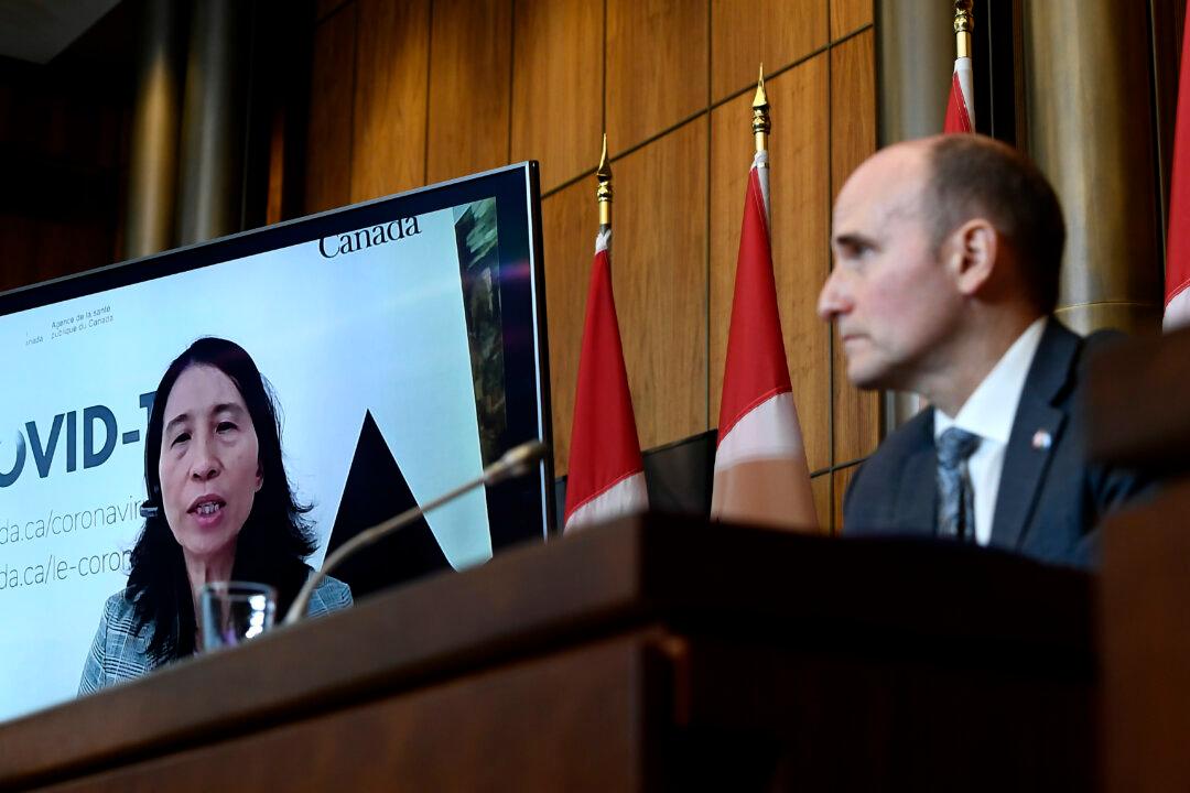 COVID-19 Policies, Vaccine Passports Need to Be ‘Re-Examined’ to Return to Normalcy, Tam Says