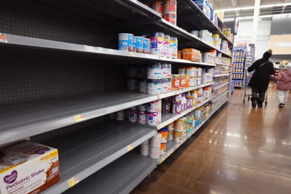 Holes on shelves in the baby formula aisles at a big box store in Chicago on Jan. 13, 2022. (Scott Olson/Getty Images)