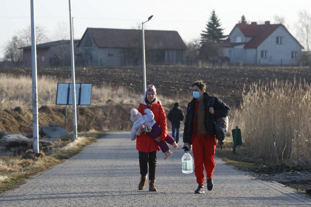 ‘My Mother Heard Explosions and Yelled That the War Is Coming’: Ukrainians React to Russian Invasion