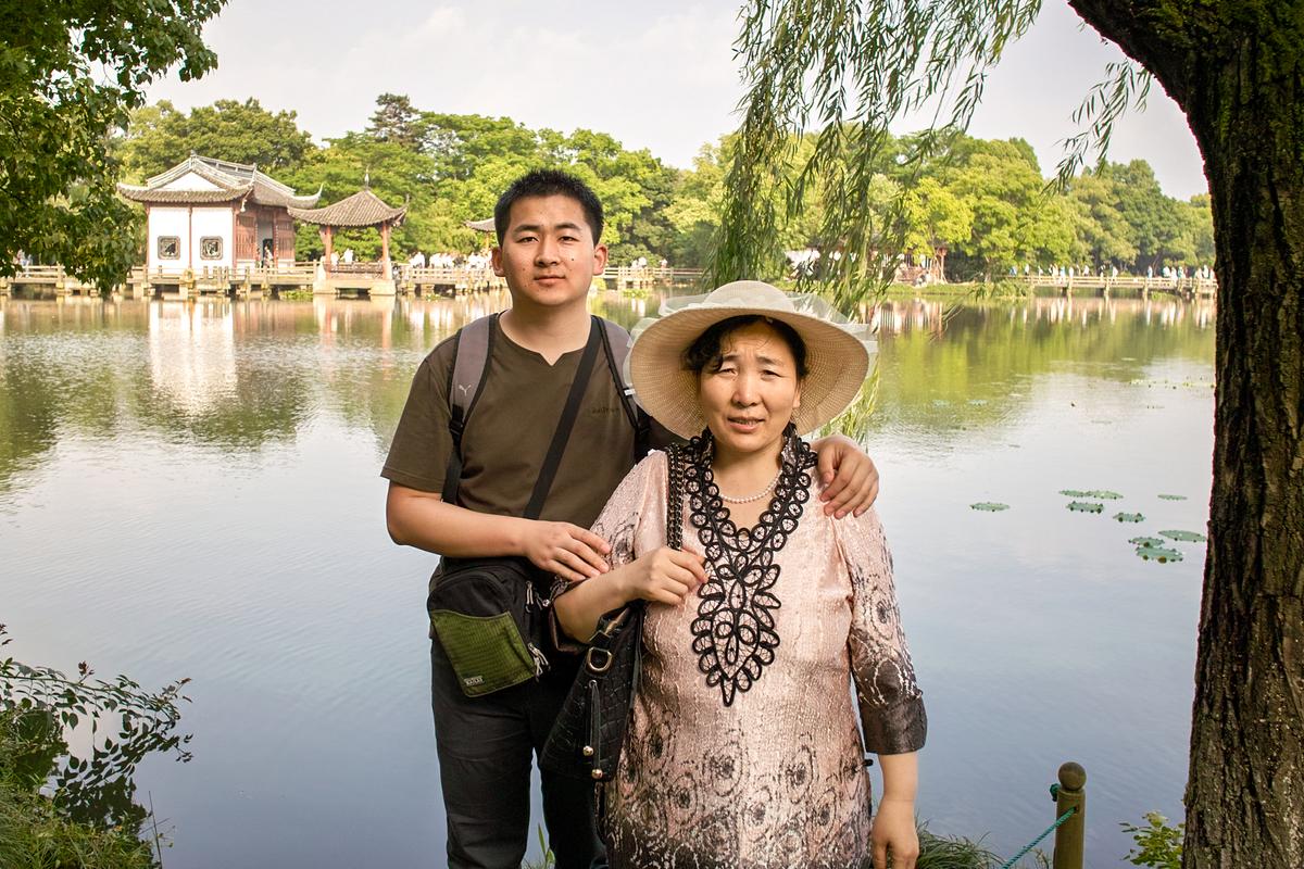 Simon Zhang and his mother Ji Yunzhi during a trip to Hangzhou city in Zhejiang Province, China, in 2012. (Courtesy of Simon Zhang)