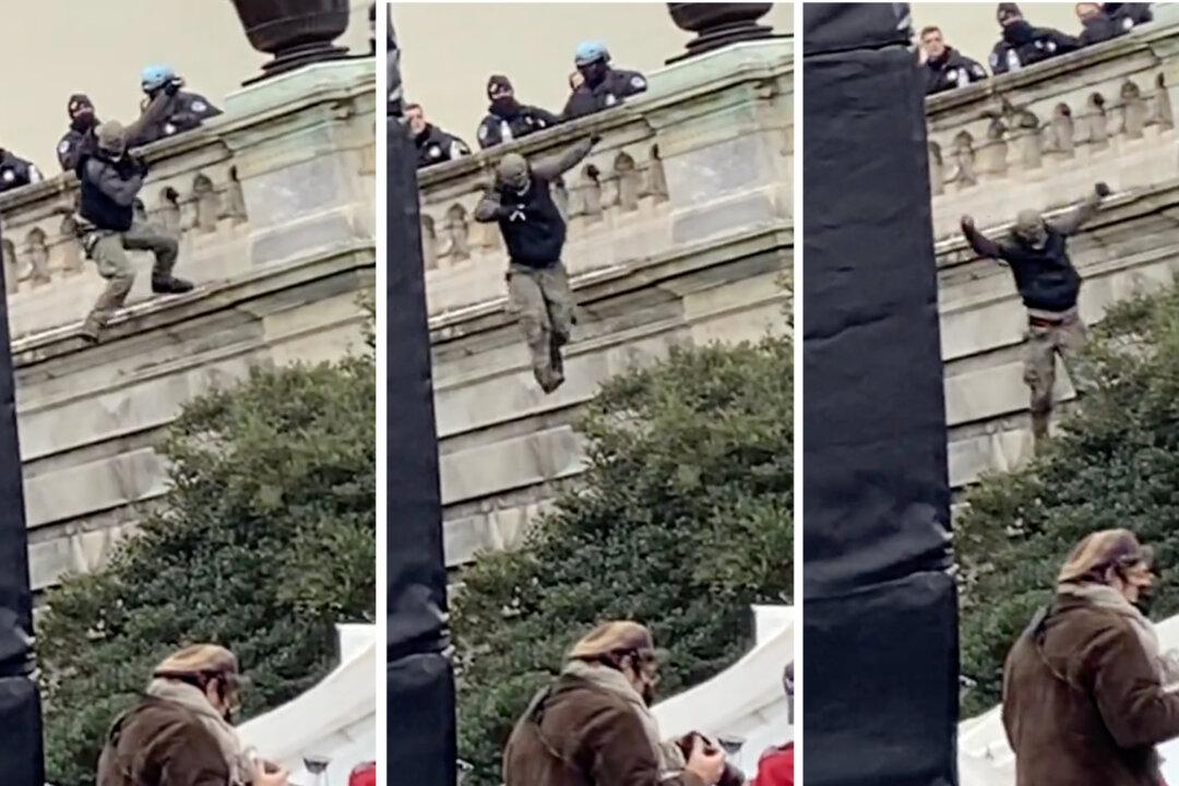 Protester Allegedly Shoved Off Ledge by Officer on Jan. 6 Comes Forward, Plans to Sue