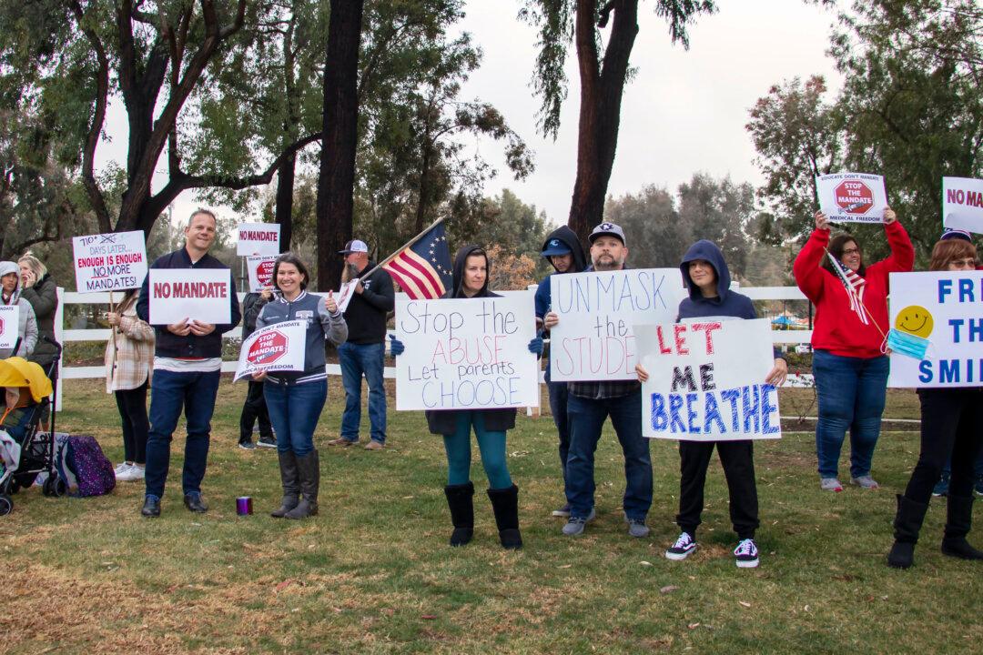 Parents, Teachers Protest Mandates as Unmasked Kids Left Out in the Rain and Cold