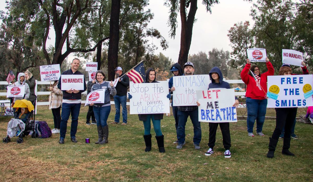 Parents, Teachers Protest Mandates as Unmasked Kids Left Out in the Rain and Cold