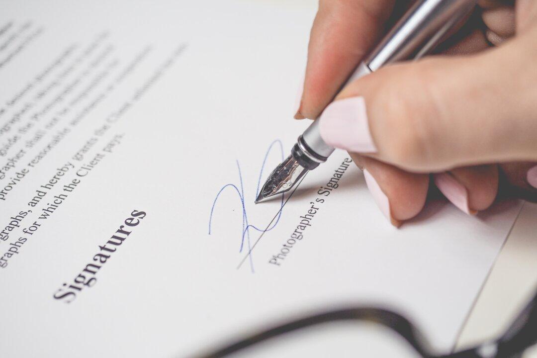 Irvine Man Who Managed Car Company Arrested on Bribery Charge