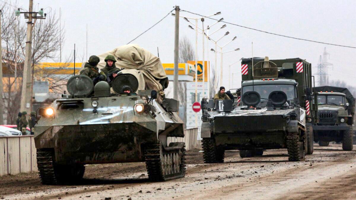 Video Shows Ukrainian ‘Tank Man’ Trying to Block Russian Military Convoy