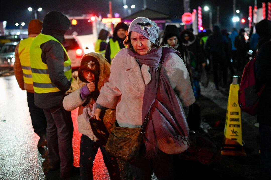 Ukraine Refugees Flood West as Border Nations Scramble to Organize Aid