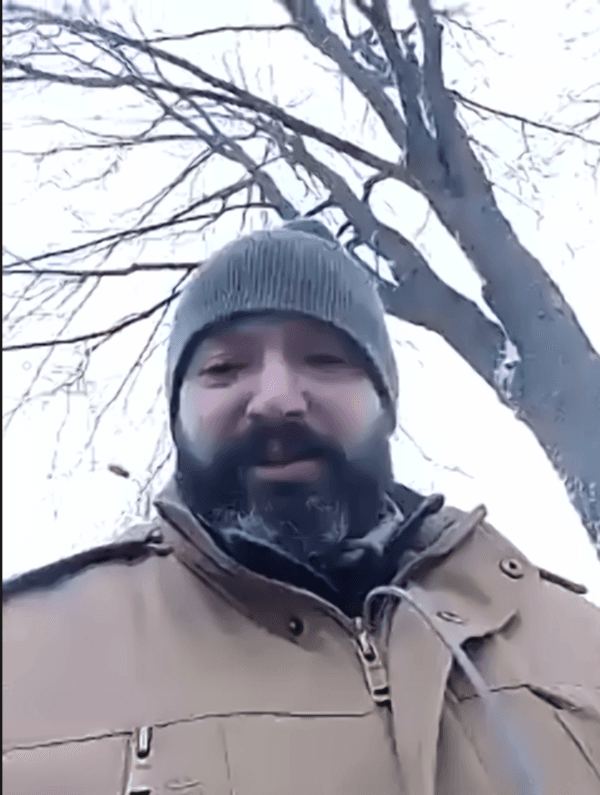 Bryan Stern, co-founder of Project Dynamo, speaks to The Epoch Times on Feb. 3, 2022, right after another bus full of American, British, Afghan, and Ukrainian citizens pulled away and started toward the Romanian/Ukrainian border as part of another evacuation. (Courtesy of Bryan Stern, Project Dynamo)