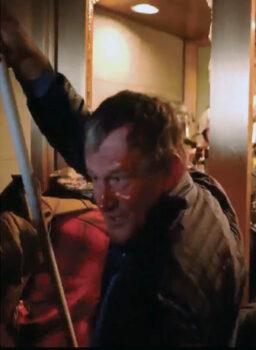 Duke E. Wilson tried to block police pepper spray with his iPad, but eventually was hit in the face. (U.S. Department of Justice/Screenshot via The Epoch Times)