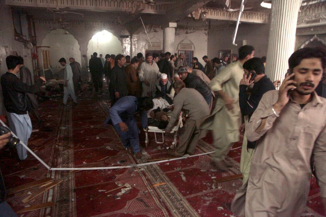 Bombing at Shiite Mosque in Pakistan Kills at Least 56 Worshippers