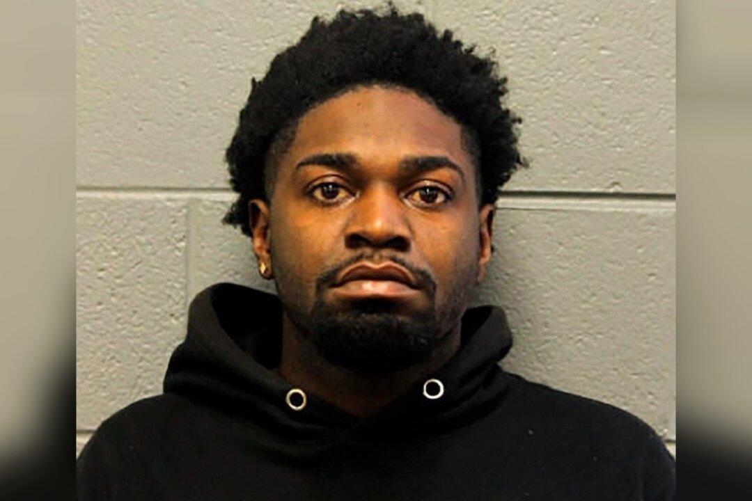 Man, 24, Charged in Shooting of 2 Chicago Police Officers