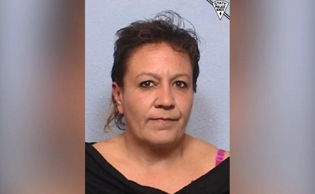 Woman Arrested in Crash That Killed 2, Including Officer