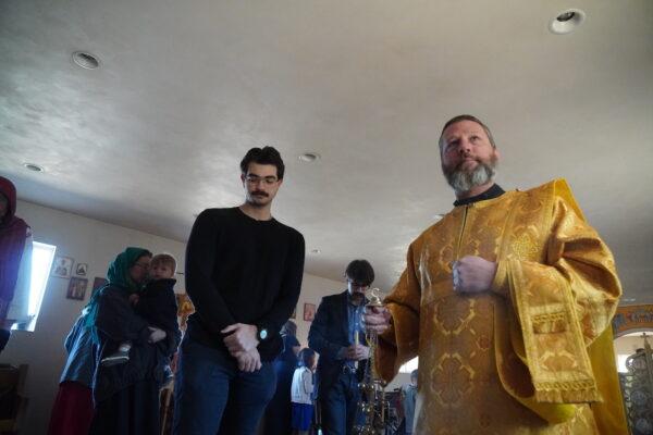 Deacon Sebastian of the Holy Archangels Orthodox Church in Phoenix, Ariz., begins the Sunday morning liturgy service on March 6. (Allan Stein/The Epoch Times)