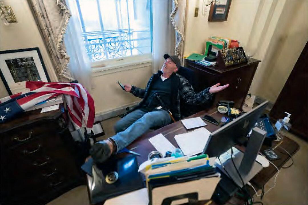 DOJ Offers 70- to 87-Month Prison Sentence to Man Photographed With Feet Up in Nancy Pelosi’s Office