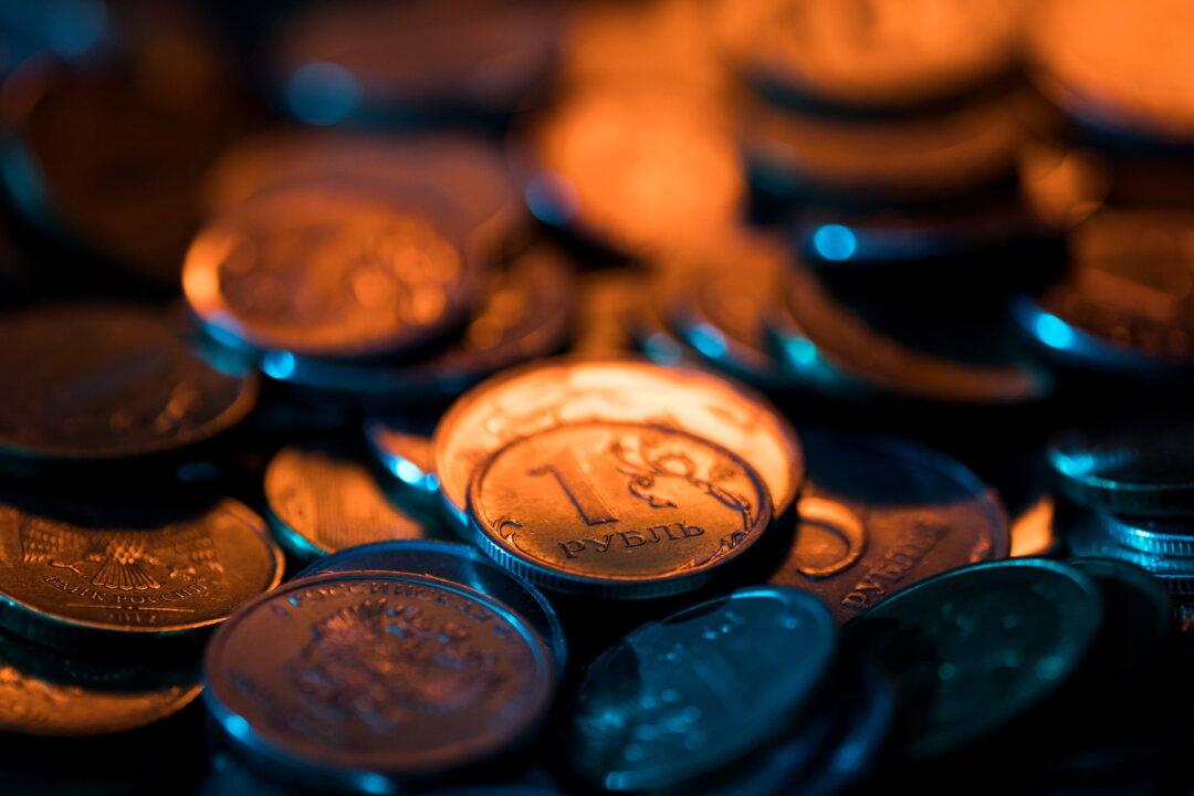 Rouble Firms Past 90 vs Dollar, Russian Stocks Extend Slide in Volatile Trade