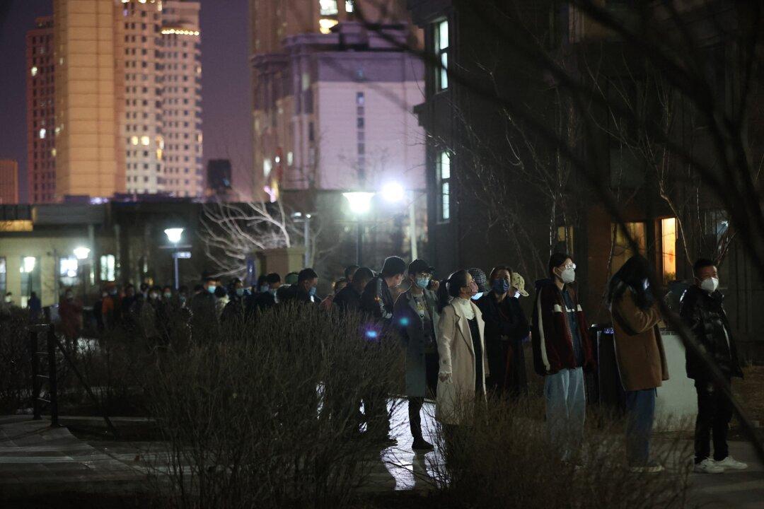 China Locks Down City of 9 Million Amid New Spike in COVID-19 Cases