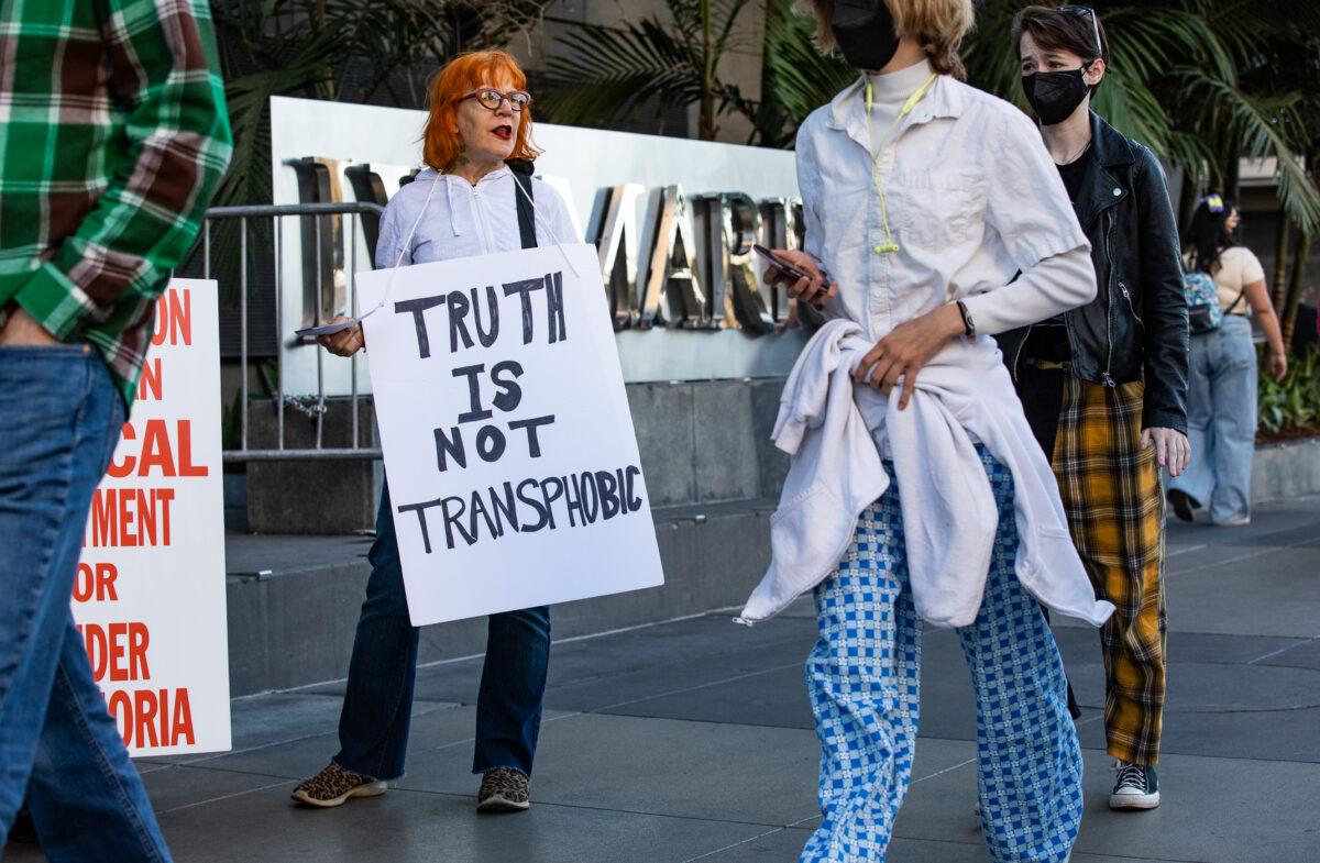 Demonstrators share about Detransition Awareness Day in Los Angeles on March 12, 2022. (John Fredricks/The Epoch Times)