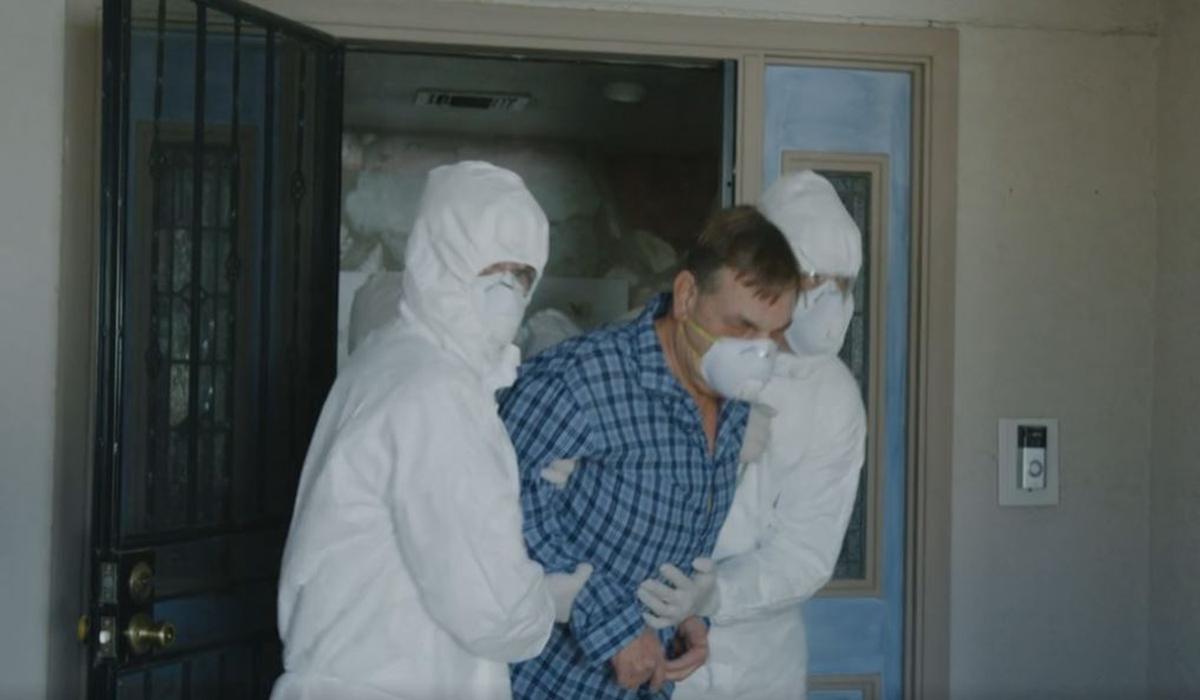 Bruce (Keith Lopez) gets hauled off to medical quarantine in “Anti Coronavirus.” (Applied Art Productions)