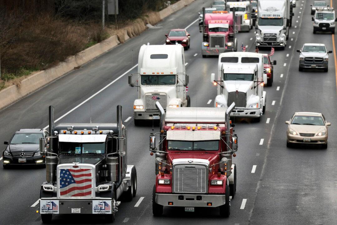 Vehicles in Truck-Led Convoy Ride Through Washington, DC